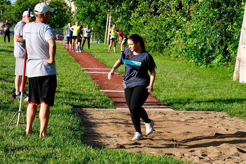 Woman Trying to Long Jump